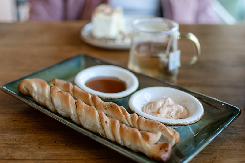 Garlic breadsticks appetizer with marinara dipping sauce