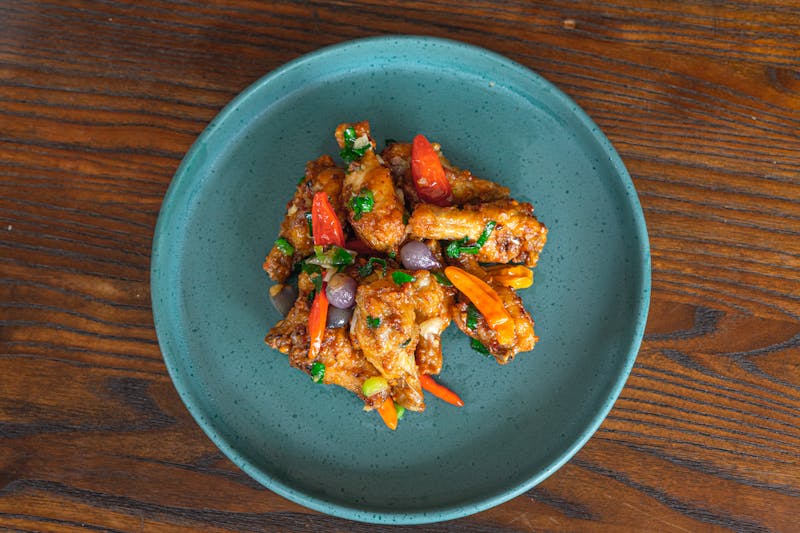 Buffalo chicken wings appetizer with blue cheese dip